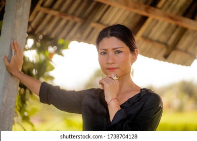 files/outdoors-portrait-attractive-relaxed-asian-260nw-1738704128.webp